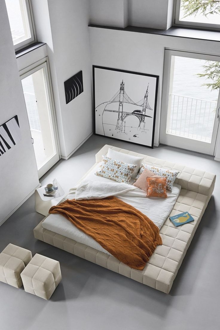 A quality platform bed is one you could spend all day on. A fabric frame wrapped around a comfy mattress with the convenience of a ledge to put your stuff. What more could you want?