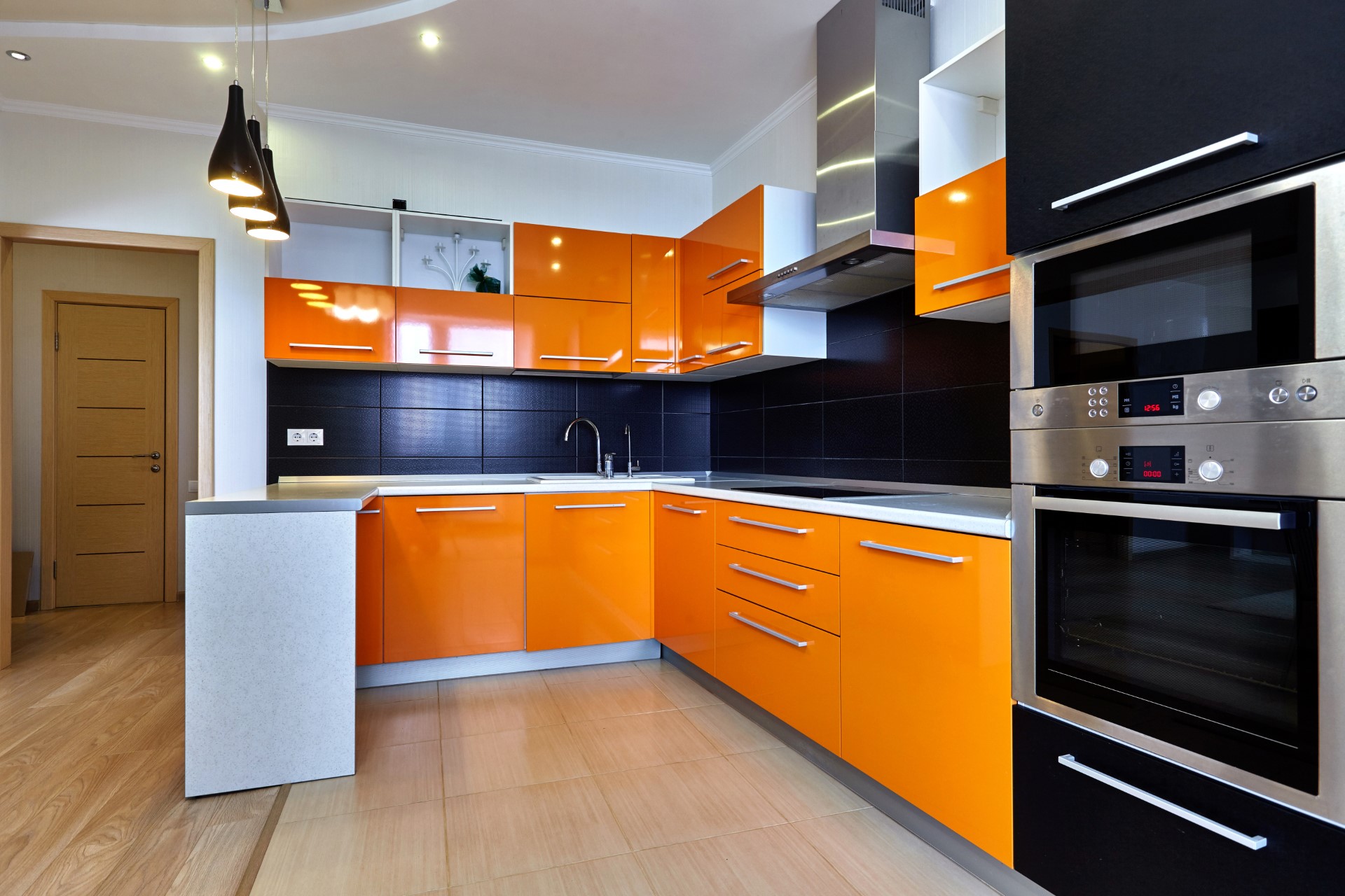 A bright orange kitchen is probably the thing you would least expect to see, but it's awesome! It's for the type of person who has no boundaries, and want something to become a centerpiece for their home. Definitely the type of abstract decoration I would bring to my home.