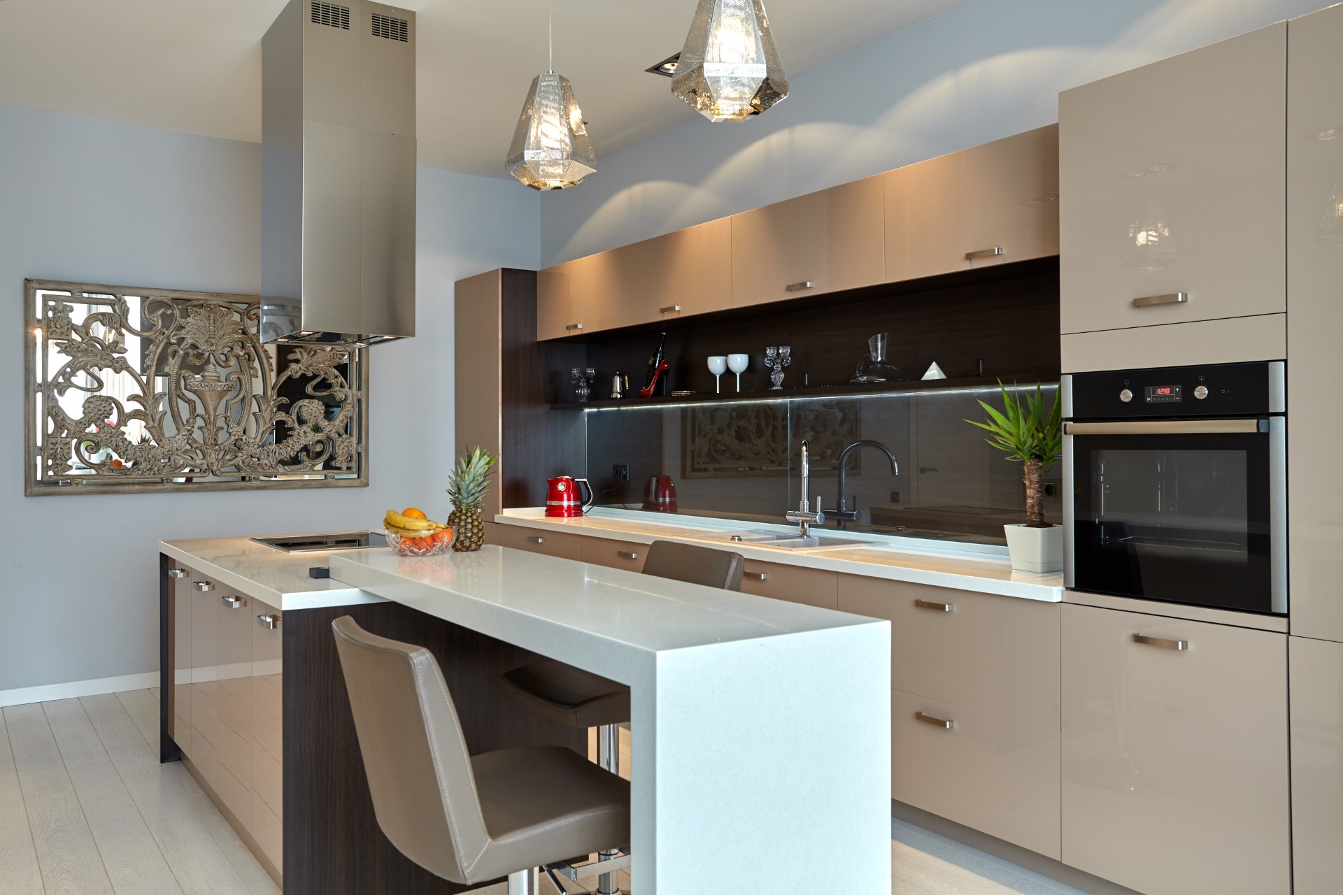 This eccentric modern kitchen has a touch of Indonesia design while keeping a minimalist structure about it. Great for someone who likes to keep it simple.