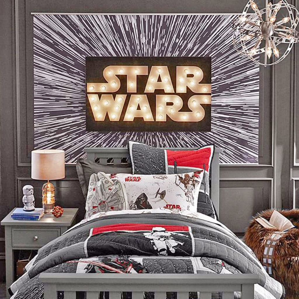 It doesn't take too much to make a good Star Wars bedroom, all you need is some bed covers and a nice poster to finally hit that Hyperdrive.