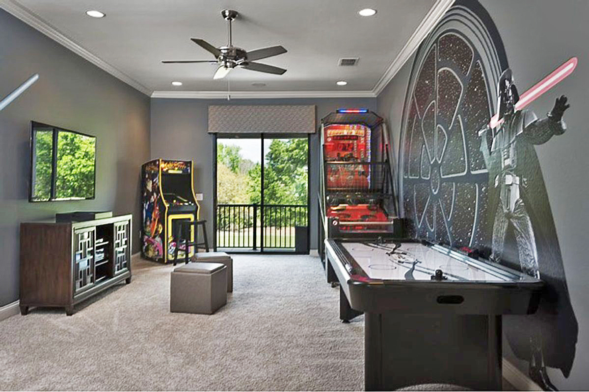 A Star Wars game room is something that sets your home apart from all the others, throw in a couple arcade games and you have a fun house.