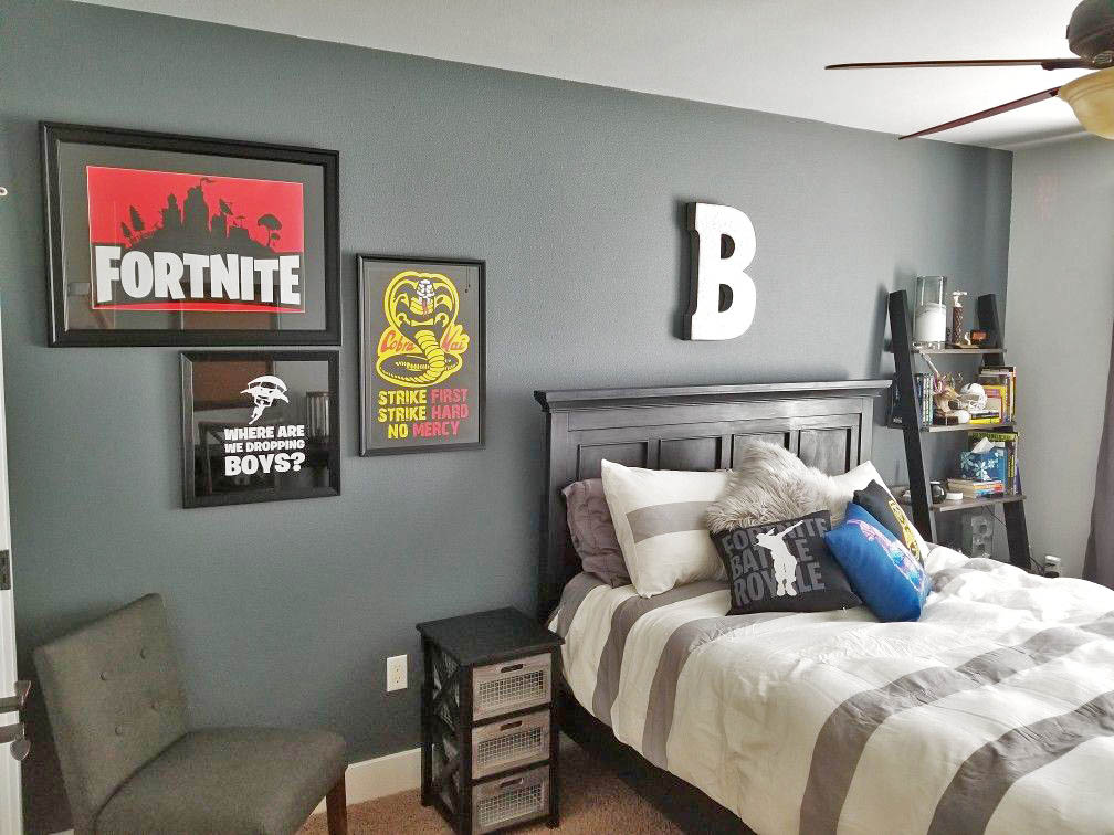 With a couple pictures and an accent wall, you can me this Fortnite themed bedroom come to life.