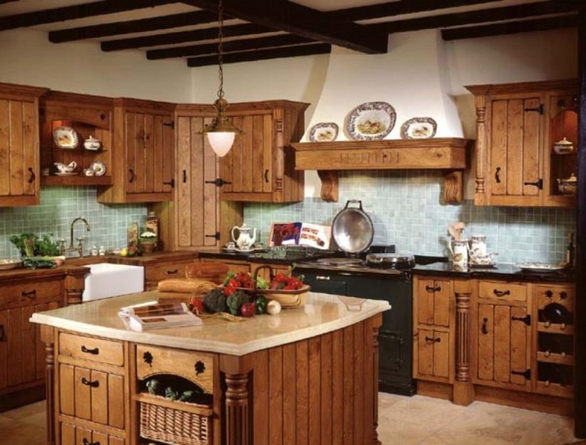 This rustic countryside farmhouse kitchen with island countertop and wood beams on the ceiling is great for entertaining.